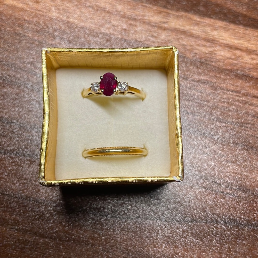 Ruby with two diamonds 14k gold ring & 18k gold band.